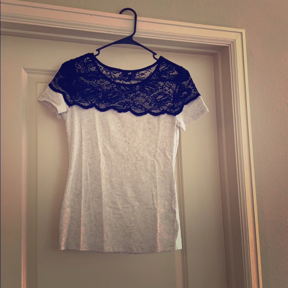 Small fitted short sleeve shirt with lace neck